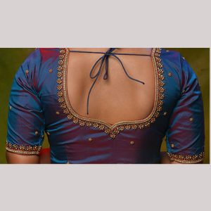 Alluring blue blouse with gold embroidery