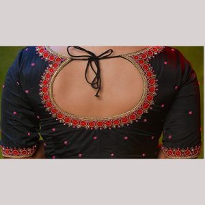 Glistening black blouse with constrast red thread embroidery