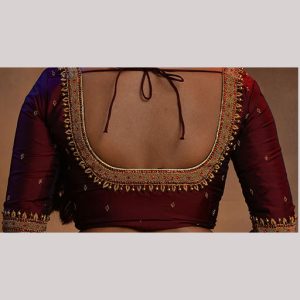 Magnificient marron blouse with  water filling and kundan work