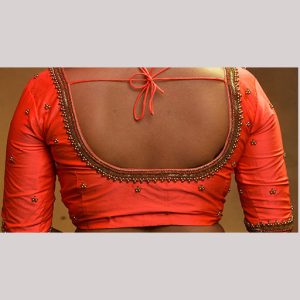 Sizzling orange blouse with antique embroidery