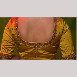 Glowing yellow blouse with bead loading embroidery