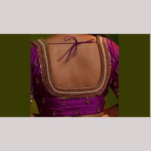 Enchanting purple bridal blouse with pendent work