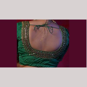 Verdant green bridal blouse with kundan & zardosi embroidery