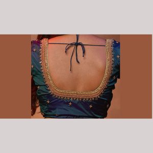 Glooming blue blouse with copper embroidery