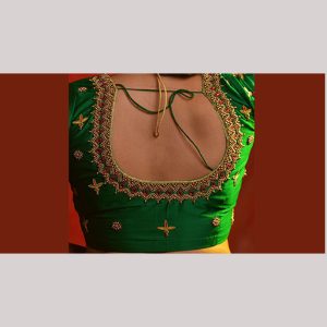 Grand green bridal blouse with gold & contrast red embroidery