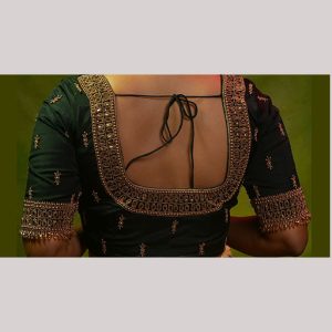 Elegant green bridal blouse with gold embroidery